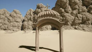 A stone structure with a cross on top of it video