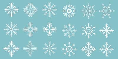 Groups of vector snowflakes, Winter set of white snowflakes isolated on light blue background. Snowflake icons. Snowflakes collection for design Christmas templates