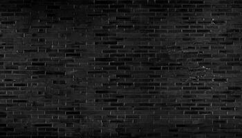 Abstract black brick wall pattern background and black backdrop, Blank copy space. photo