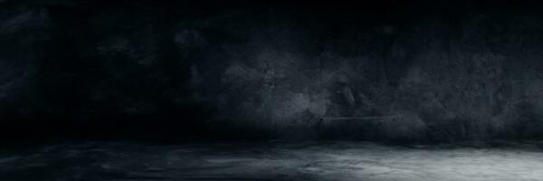 Empty space studio dark room of Plaster concrete grunge texture background for use display product. photo
