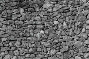 Texture of a stone wall. Old castle stone wall texture background. Stone wall as a background or texture photo