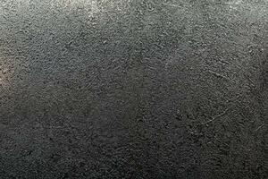 Roca textura. oscuro grafito, negro Roca antecedentes. mesa arriba, Roca losa. foto