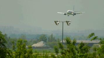 ALMATY, KAZAKHSTAN MAY 5, 2019 Passanger plane Boeing 737 of SCAT landing at Almaty International Airport, Kazakhstan, side view video