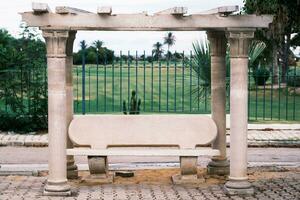 Detail from street in town of Sousse, Tunisia. Bus stop bench. photo