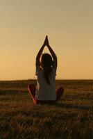 Little girl doing yoga photo