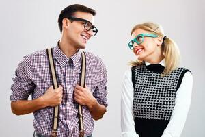 Shy nerdy woman and man are flirting photo