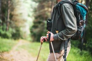 Image of man enjoys hiking in nature photo