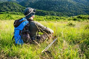 Image of hiker resting in nature photo