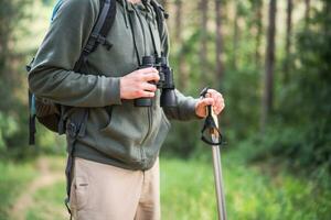 Image of man enjoys hiking in nature photo