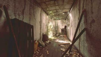 A desolate and abandoned hallway strewn with debris and destruction video