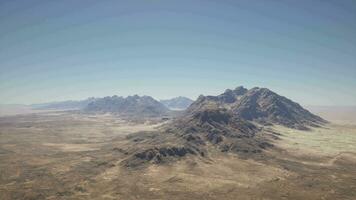 An aerial view of a mountain range in the desert video