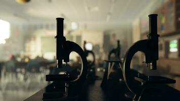 Two microscopes sitting on top of a table in a room video