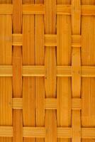 a close up of a bamboo wall with a pattern photo