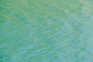 green water with small ripples photo