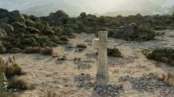 A solitary cross standing in the vastness of a desert landscape video