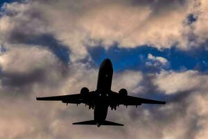 a large jetliner flying through the sky photo