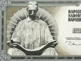 Statue of Nikola Tesla by Frano Krsinic from money photo