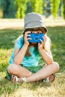 Little girl photographer photo