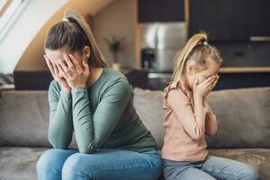 Mother and daughter are having conflict at their home photo