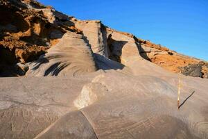 the rock formations are made of sand and rock photo