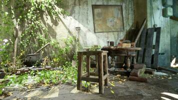 An abandoned room with a chair and table in a state of devastation video