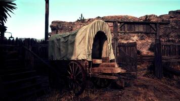An authentic western town with a rustic covered wagon video