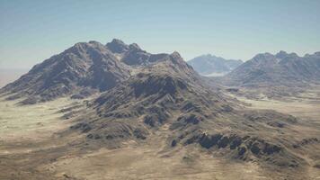 An aerial view of a mountain range in the desert video