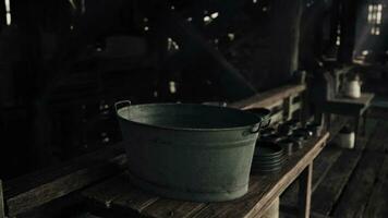 A bucket sitting on a wooden table video