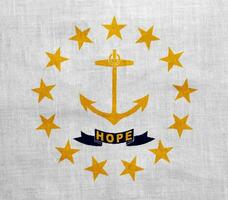 Flag of State of Rhode Island on a textured background. Concept collage. photo