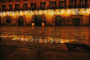 Christmas decorations at night in Alicante city photo