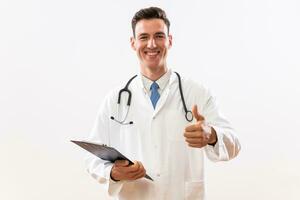 Portrait of doctor showing thumb up and holding documents photo