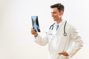 Portrait of doctor doctor holding x ray image photo