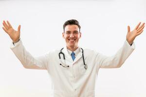 Portrait of happy and content doctor with open arms photo