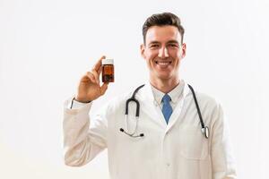 Image of doctor showing bottle of pills photo