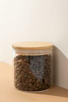 Reusing Glass Jars To Store Dried Food Living Sustainable Lifestyle At Home. coffee beans in glass jar photo