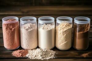 variety of flavored protein powder in jars. AI Generated photo