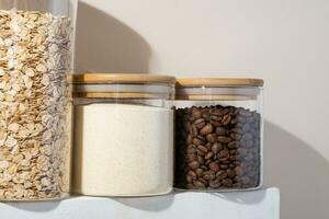 Reusing Glass Jars To Store Dried Food Living Sustainable Lifestyle At Home. coffee beans in glass jar photo