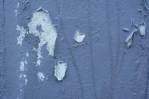 Concrete wall texture with Crack white color paint,Cement floor with Broken rough concrete surface,Light Grey background with plaster on building wall,Exterior wall Backdrop background with copy space photo