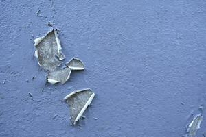 Concrete wall texture with Crack white color paint,Cement floor with Broken rough concrete surface,Light Grey background with plaster on building wall,Exterior wall Backdrop background with copy space photo