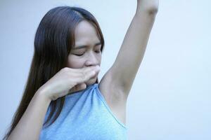 Asian women have damp armpits. photo