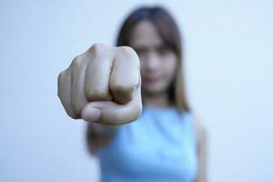 asian woman Raise your fist and get ready to fight. photo