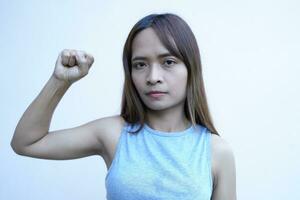 asian woman Raise your fist and get ready to fight. photo