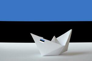 Estonia flag depicted on paper origami ship closeup. Handmade arts concept photo