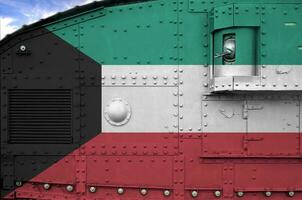 Kuwait flag depicted on side part of military armored tank closeup. Army forces conceptual background photo