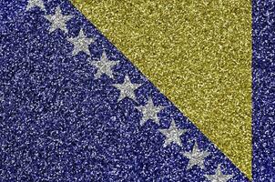 Bosnia and Herzegovina flag depicted on many small shiny sequins. Colorful festival background for party photo