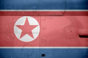 norte Corea bandera representado en lado parte de militar blindado helicóptero de cerca. Ejército efectivo aeronave conceptual antecedentes foto