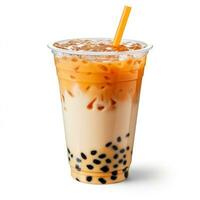 Light brown creamy bubble tea with milk and black tapioca with a green straw in a transparent cup isolated on white. Generative ai photo