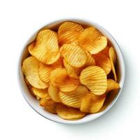 Bowl of crispy wavy potato chips or crisps isolated on a white background, top view. Generative ai. photo