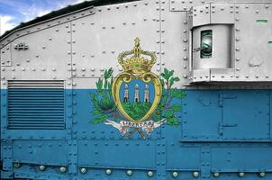 San Marino flag depicted on side part of military armored tank closeup. Army forces conceptual background photo