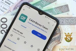 TERNOPIL, UKRAINE - AUGUST 3, 2023 Credit Agricole application on screen on modern smartphone. Official app of famous polish bank photo